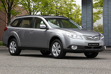 Front side view of a grey Subaru Outback.