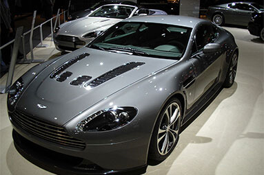 Front side view of a grey Aston Martin Vantage.