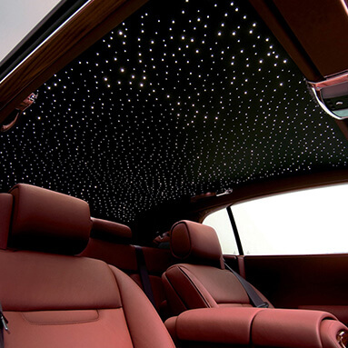 Interior of Rolls-Royce phantom with light features.