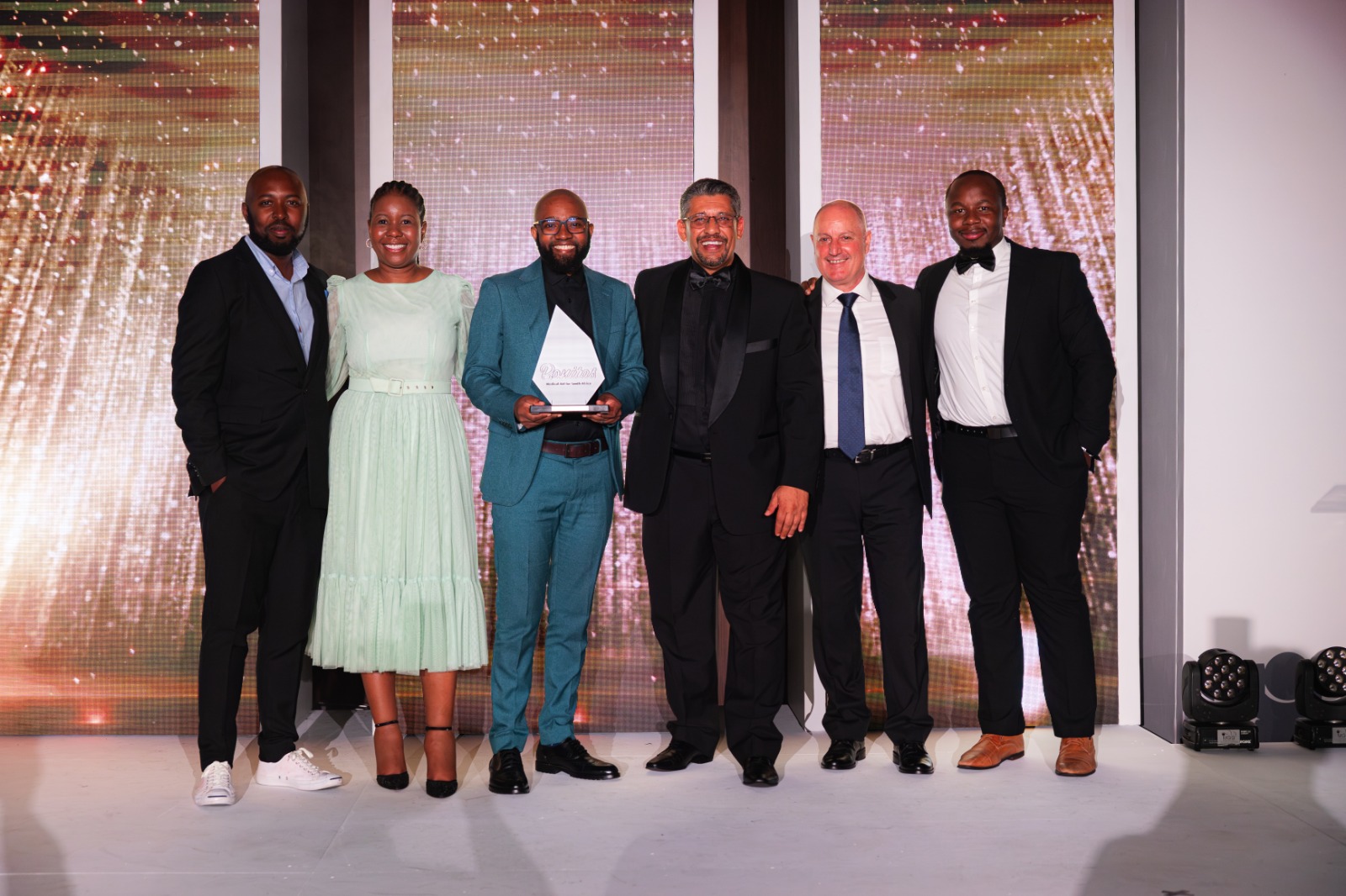 Photographed holding Bonitas Top Broker Award (L-R): Musa Masuku, Vurhonga Rukhotso, Mzwandile Mthembu, Lee Callakoppen, Anton Le Roux, Tichakunda Munodawafa
