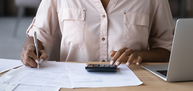Lady calculating PAYE