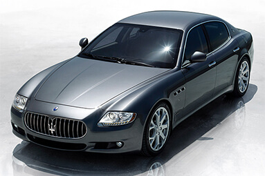 Black 2008 Maserati Quattroporte S parked sideways with overhead shot.