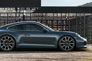 side shot of silver Porsche 911