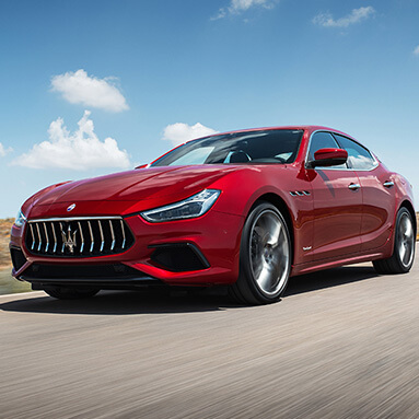 Side view of Maserati Ghibli diesel in motion.