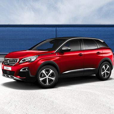 Red peugeot 2008 SUV parked sideways