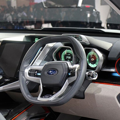 Steering wheel of a Subaru car.