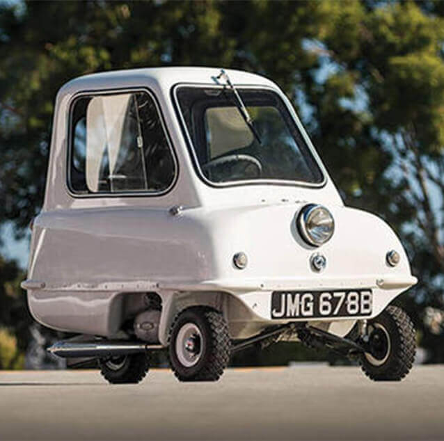 Front side view of a white Peel P50.