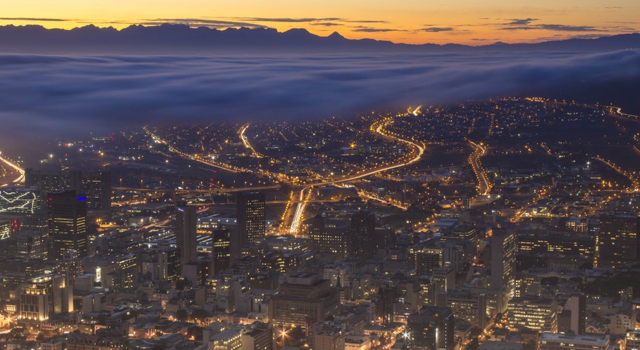 Night time image of signal hill in cape town with beautiful lights.