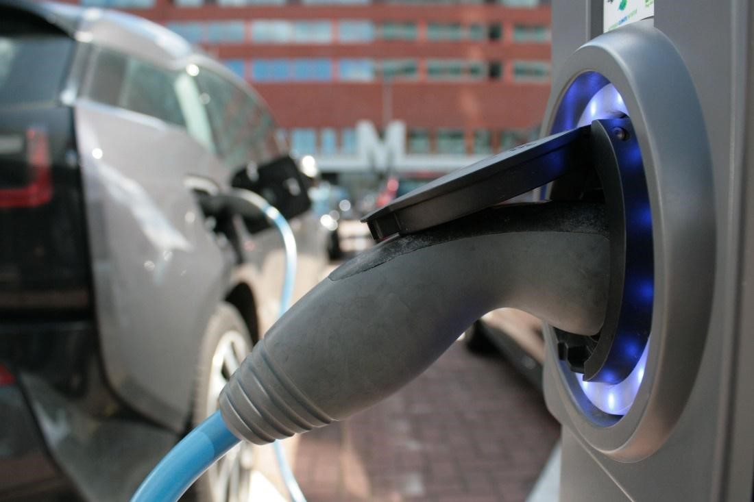 BMW EV I3 refilling at an electric vehicle charging station