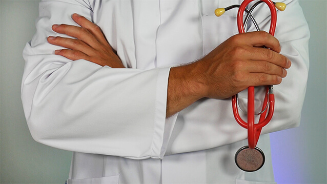 Doctor with stethoscope in hand