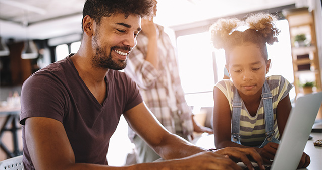 a man and his child use fibre internet to work from home