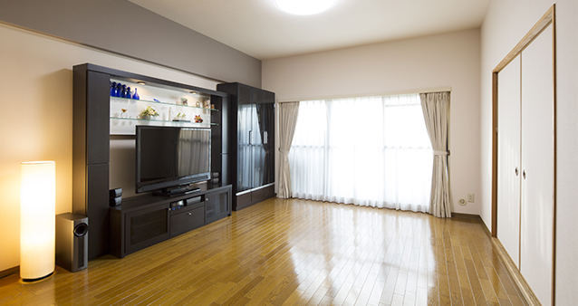 Empty living room with a TV unit and television