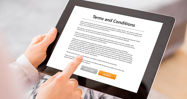 Fine print and terms and conditions on a tablet 