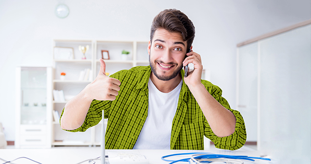 Man sitting at table with router in front of him