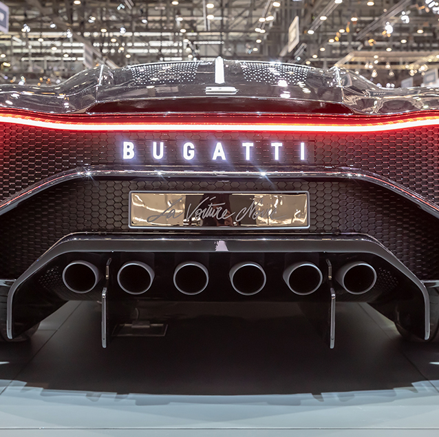 Back view of the Bugatti La Voiture Noire showing the Bugatti logo, exhaust pipes and signature.