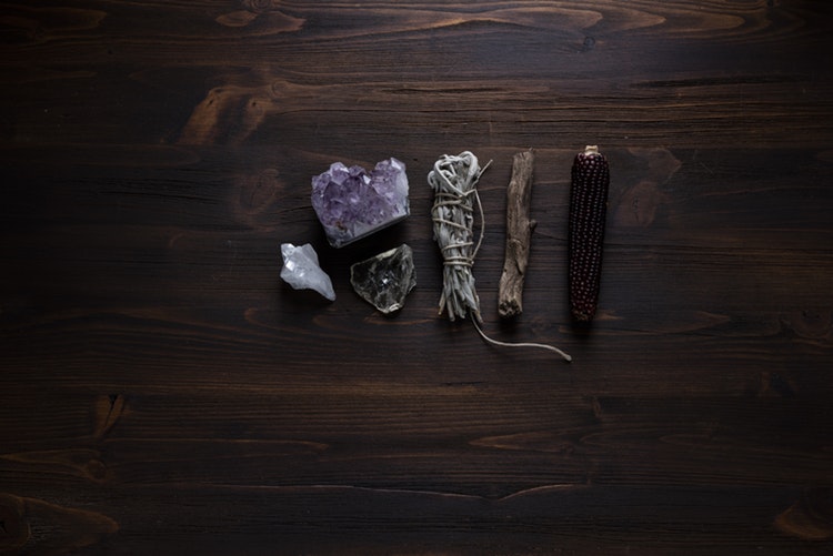 Natural medicines laying on table next to each other.