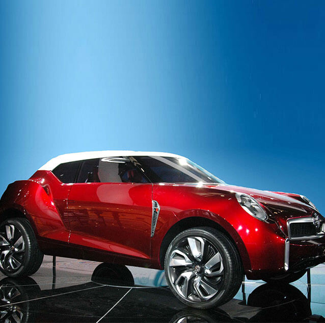Side view of a red MG Icon Concept Car.