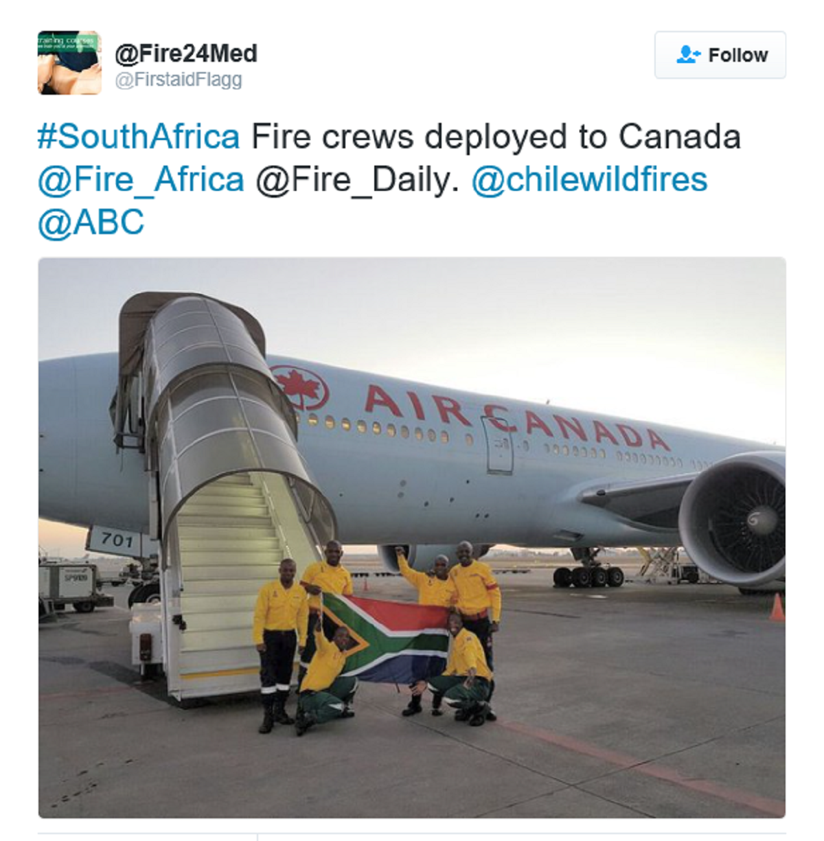 Firefighters in Front of Plane | SA Firefighters Trip 