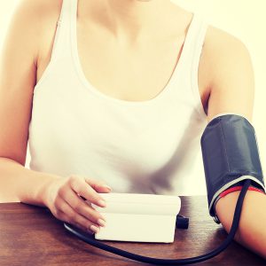 Arm checking blood pressure 