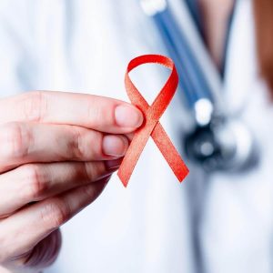 Doctor holding AIDS ribbon
