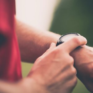 Man checking wrist watch timer 