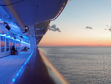 View from ship at sunset overlooking the ocean | Why you need travel insurance | Hippo.co.za travel insurance partner