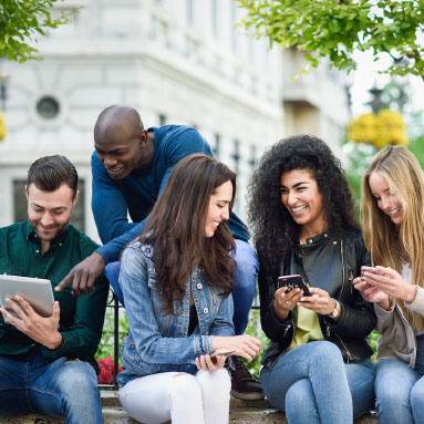 Group of students on mobiles