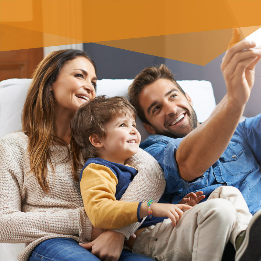 Family of three taking a selfie