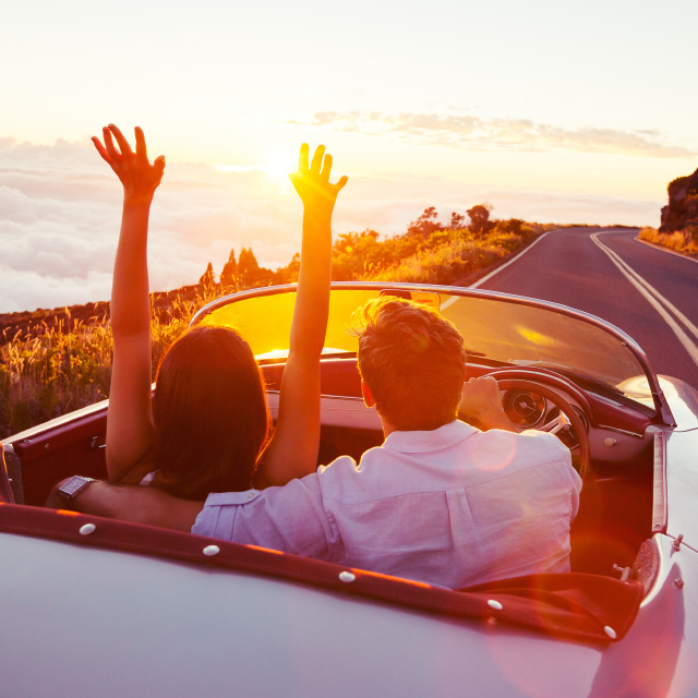 Couple driving during sunset | History of dotsure.co.za | Hippo.co.za partner