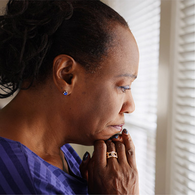 Woman resting her hands on her chin sad as she contemplates a legal disputes outcome | Added optional benefits | Hippo.co.za partner