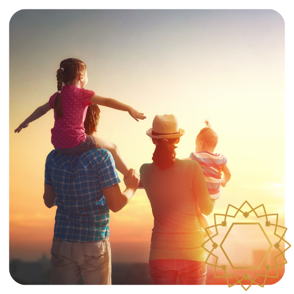 Family watching the sunset