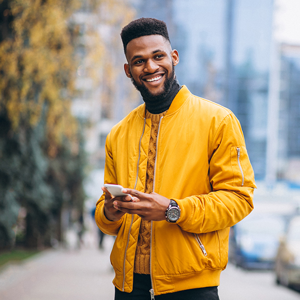 Young man with phone in hand