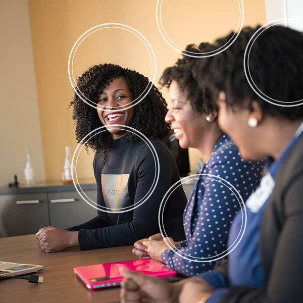 People sitting around the boardroom table