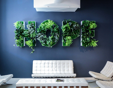 Waiting room with couches and the word HOPE on the wall | What's great about us | Hippo.co.za partner