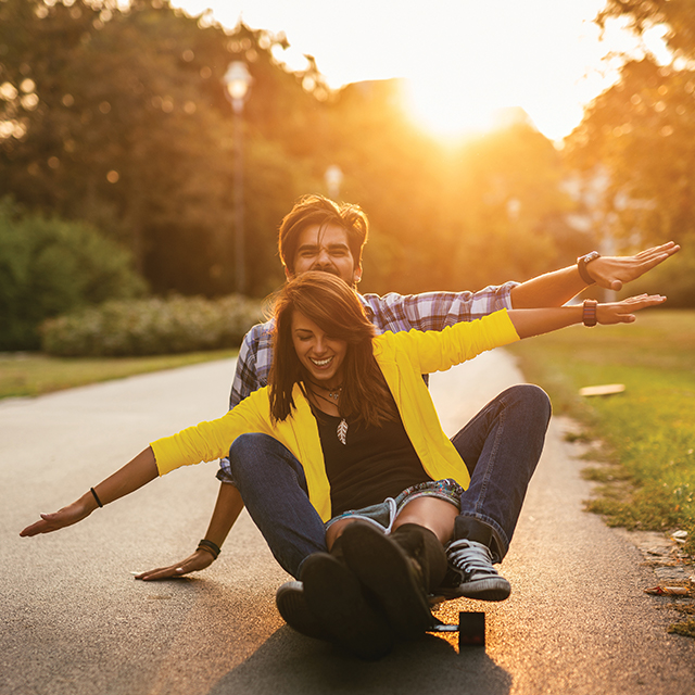 Young couple on skateboard 