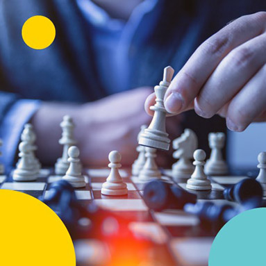 Man in suit playing chess