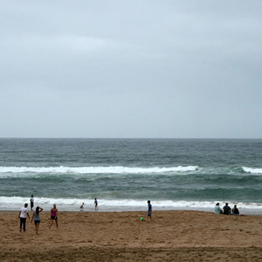 People playing on the beach.