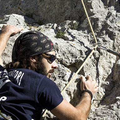 Man rock climbing in Greece.