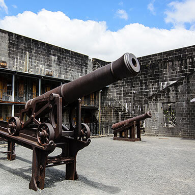Old rusty cannon in Fort Adelaide, Port Louis.