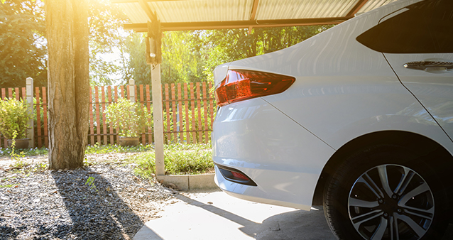 Car parked under covering to lessen risk of damage during lockdown