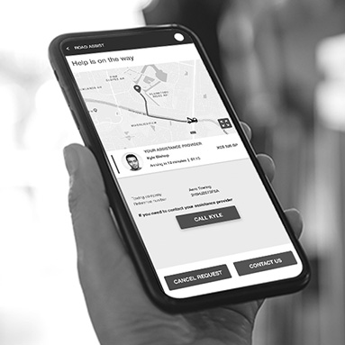 Mobile phone in hand displaying mobile app | road assist | Hippo.co.za partner